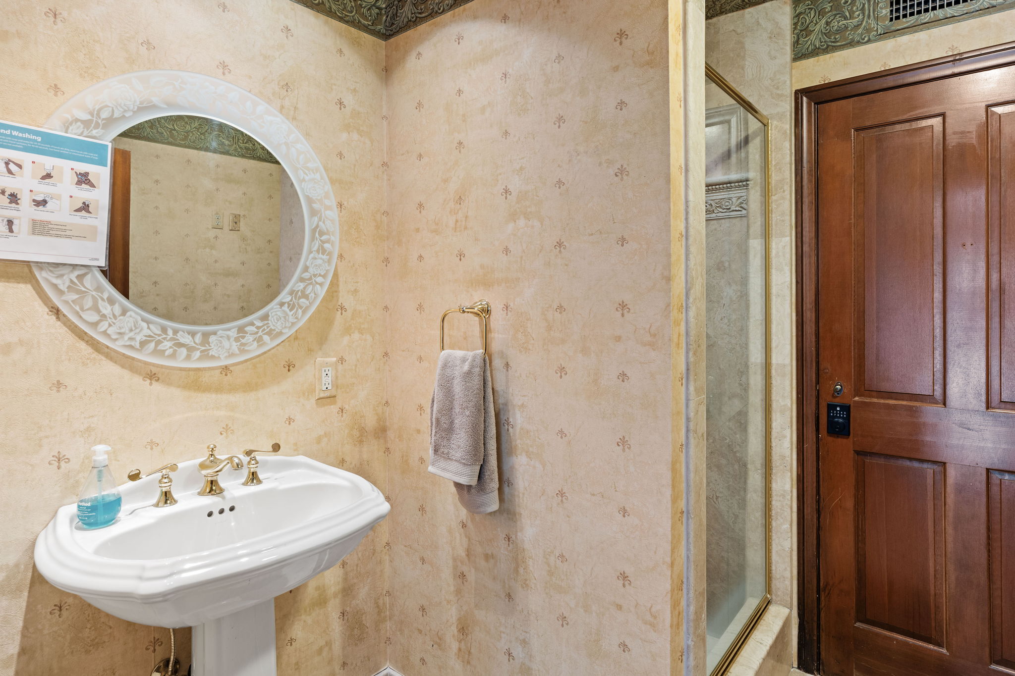 Compact en-suite powder room with refined finishes