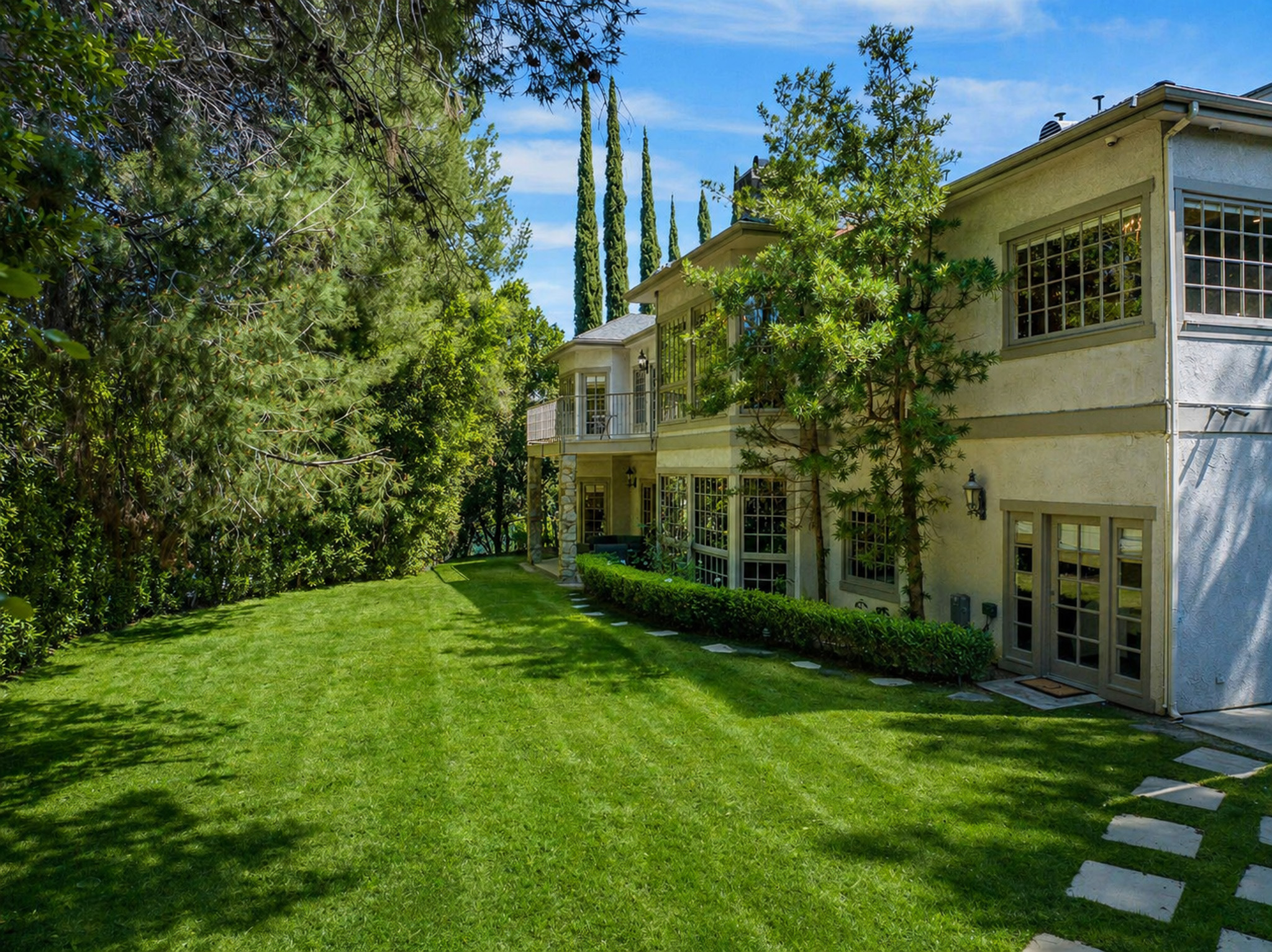 A paver path leading through the grounds at Chelsea Manor — a visual metaphor for the relapse prevention planning that prepares each client for life after treatment