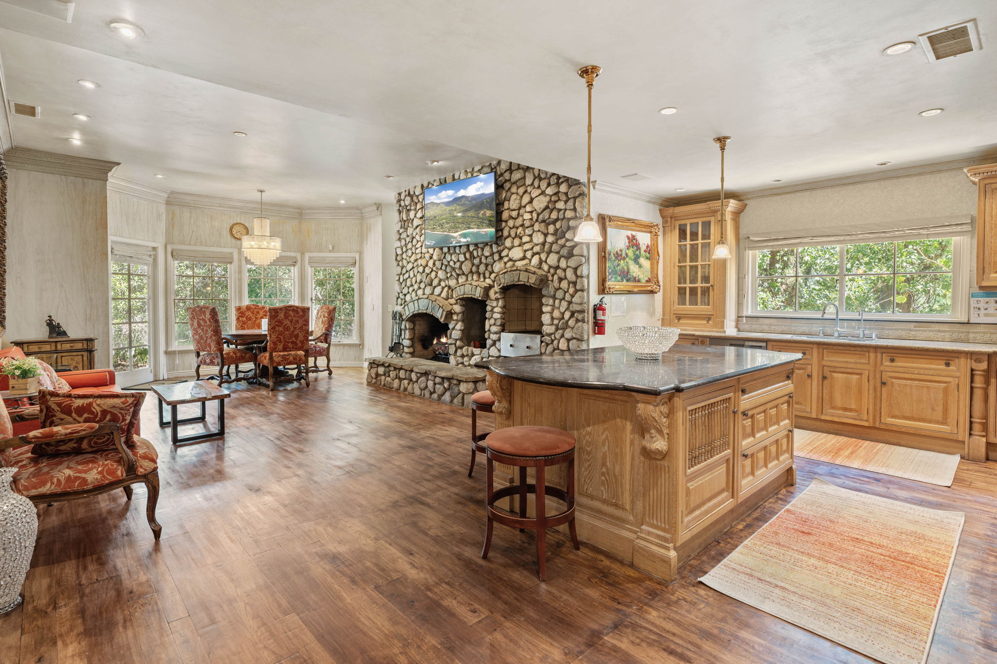 Open-plan kitchen flowing into the great room living space