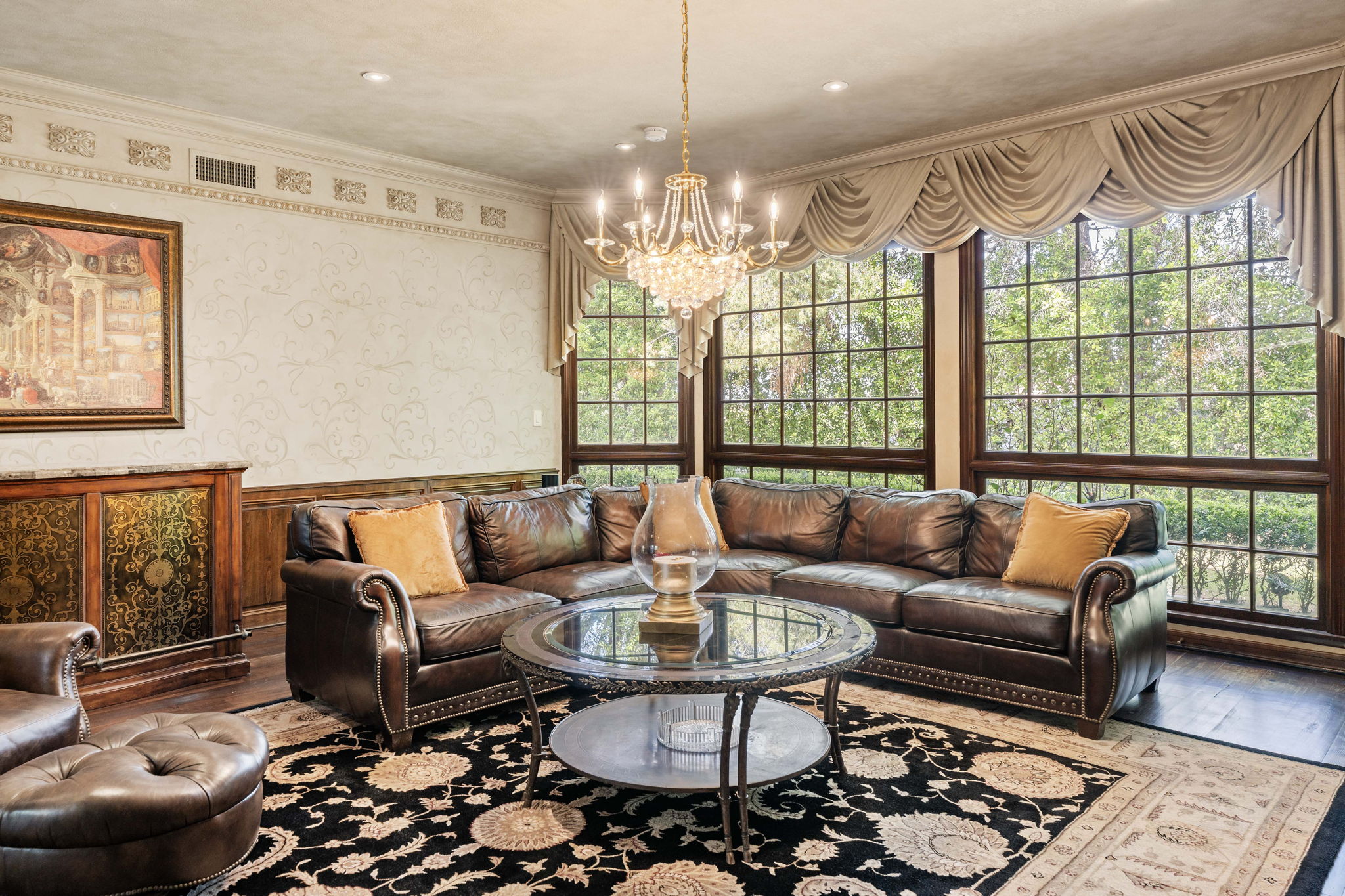 Warm lounge with classic chesterfield sofas and warm lighting